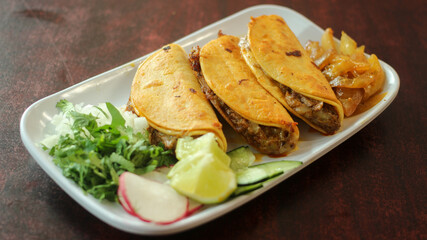 Beef Tacos with limes and salad 