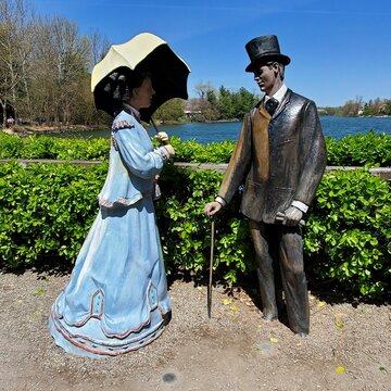 Statue Of Man And Woman At Grounds For Sculpture Museum