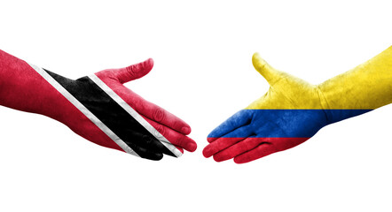 Handshake between Colombia and Trinidad Tobago flags painted on hands, isolated transparent image.