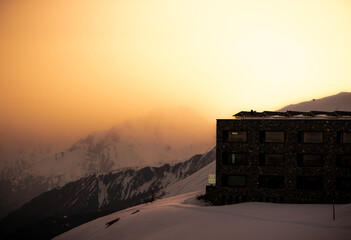 Hotel in the mountains during sunset   