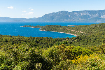 Obraz premium View of the Incekum peninsula, the site of Incekum plaji beach, along the Gulf of Gokova coastline in Mugla, Turkey.