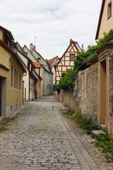 Fototapeta na wymiar An old narrow street in Rothenburg ob der Tauber, Germany
