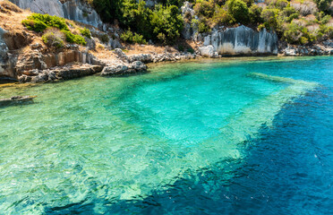 Coast of Kekova island with visible underwater structures of the Sunken City, in Antalya Province...