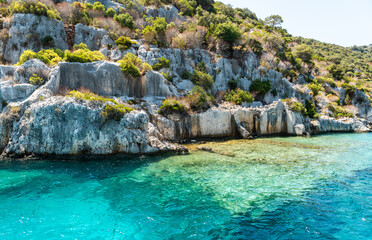 Coast of Kekova island with visible underwater structures of the Sunken City, in Antalya Province of Turkey