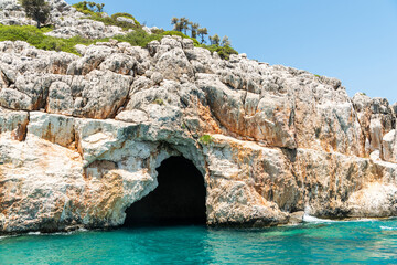 Blue Cave, also known as the Pirates Cave, on the Mediterranean coastline of the Kekova region of Antalya province in Turkey.
