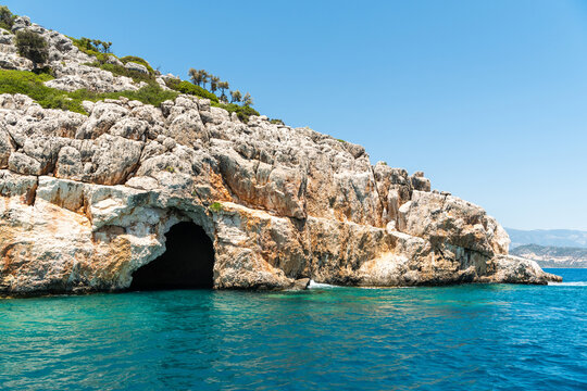 Blue Cave, also known as the Pirates Cave, on the Mediterranean coastline of the Kekova region of Antalya province in Turkey.