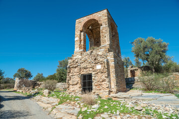 Ruined historic basilica tower in Kiyikislacik village of Mugla province in Turkey.