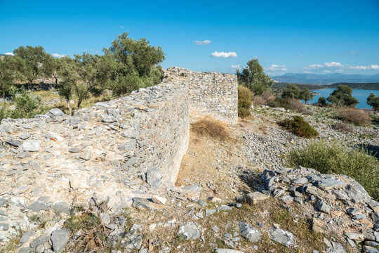 Ruined wall of acropolis, later converted into a fortress, at Iasos ancient site in Mugla province of Turkey.
