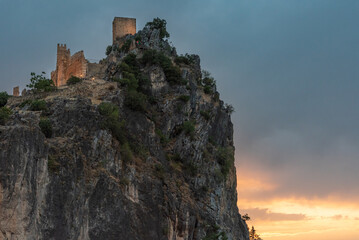 Fototapeta na wymiar Castle of La Iruela, in the natural park of Cazorla, Segura and Las Villas, Jaen, located on top of a steep cliff.