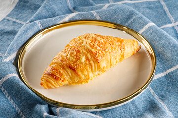Fresh croissants with cheese. traditional hommade french pastries for breakfast. freshly baked delicious croissants.