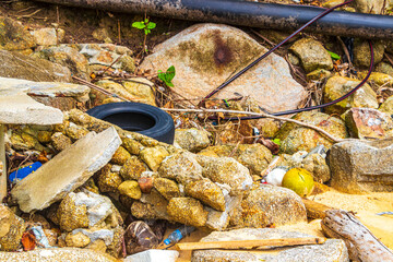 Garbage Dirt Plastic Poison Litter and Pollution on Beach Thailand.