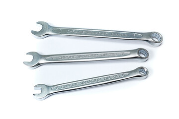 Working tools and drawings of the designer on a white background. Construction of houses, drawing, interior design.