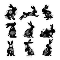 Obraz na płótnie Canvas Collection of black rabbits with floral motifs. Easter bunny decoration. Rabbit silhouette