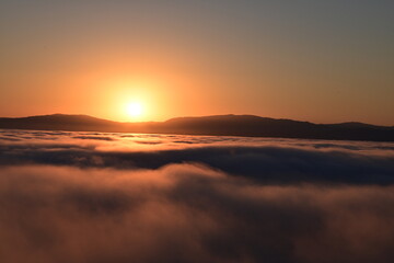 sunrise over the clouds