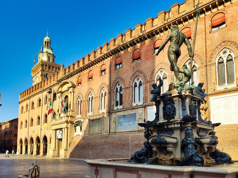 Nettuno 1567 bronze statue and fountain in front of Accursio palace, Piazza Maggiore square, the seat of the municipal government of Bologna city, Italy