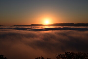 sunrise over the clouds