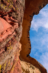 Looking up at the overhanging ledge of Mushroom Rock in the Golden Gate Highlands National Park. This nature reserve is part of the Maluti Mountains belonging to the Drakensberg range in South Africa