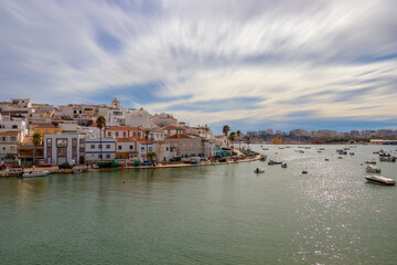 Fototapeta na wymiar Landscape of the Fishing Pier in the Algarve village of Ferragudo, Portugal