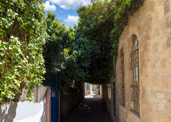 Fototapeta na wymiar Israel, Jerusalem old narrow streets of Nahlaot historic neighborhood with many small synagogues.