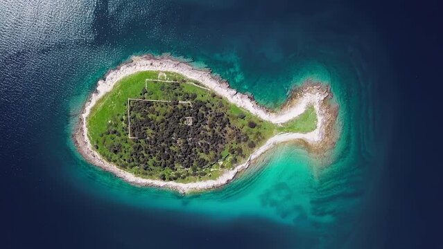 Flight over fish shaped island Gaz in Brijuni islands, Croatia.