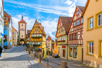 Fototapeta na wymiar The picturesque Plönlein, or Little Square, a famous split in the road in the Bavarian village of Rothenburg ob der Tauber, Germany.