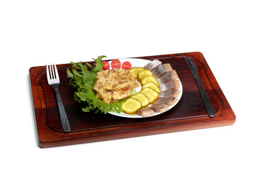 Healthy eating. Potatoes, tomatoes, toast, herring on a plate.