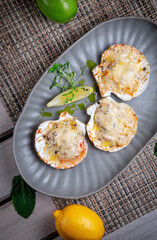 Scallops with cream-mushroom sauce and truffle oil