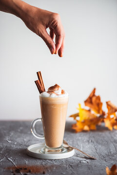 Spicy latte with pumpkin and whipped cream