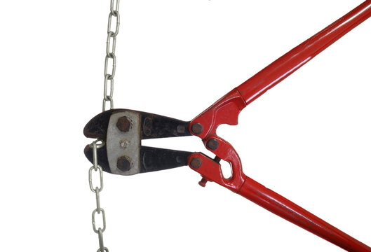 Bolt cutters cutting a metal chain isolated.