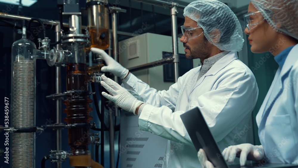 Poster two scientist in professional uniform working in laboratory for chemical and biomedical experiment