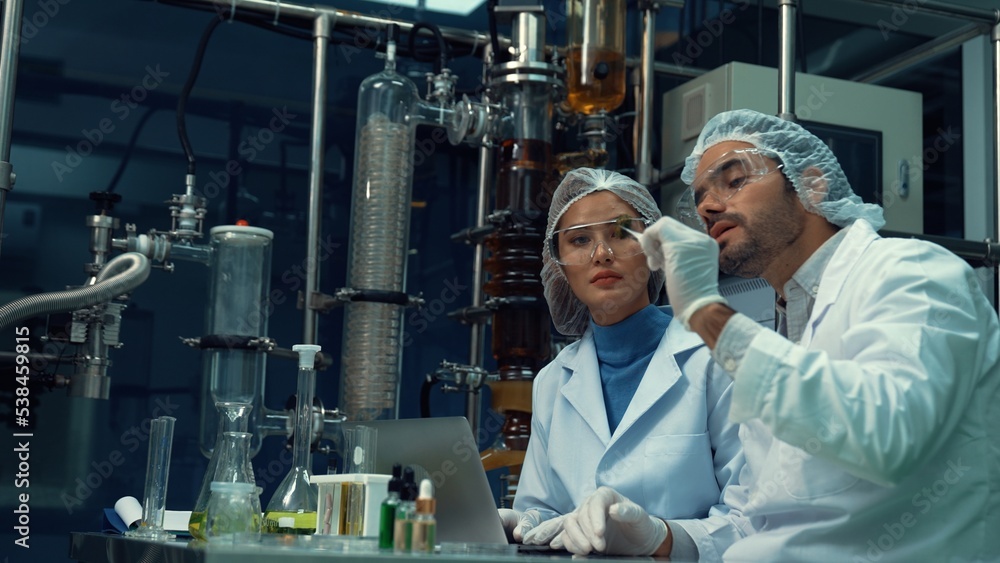 Poster two scientist in professional uniform working in laboratory for chemical and biomedical experiment