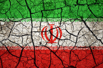 Dry soil pattern on the flag of Iran. Country with drought concept. Water problem. Dry cracked earth country.	