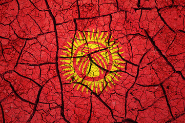 Dry soil pattern on the flag of Kyrgyzstan. Country with drought concept. Water problem. Dry cracked earth country.	