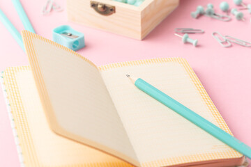 School stationery in turquoise color, flat lay. Back to school