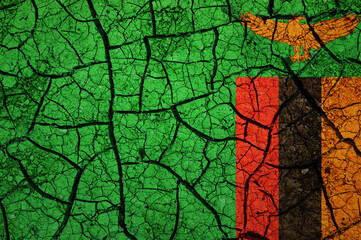Dry soil pattern on the flag of Zambia. Country with drought concept. Water problem. Dry cracked earth country.	