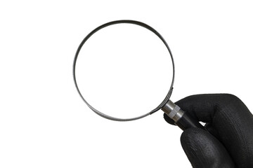Detective with black glove is holding magnifying glass in hand.