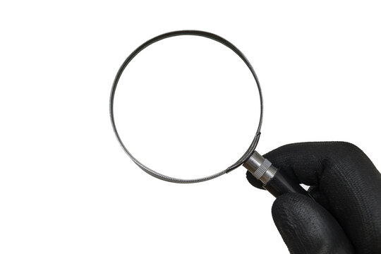 Detective With Black Glove Is Holding Magnifying Glass In Hand.