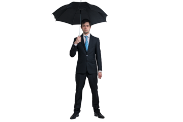 Businessman is holding black umbrella. Isolated on transparent background.