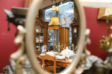 Fototapeta premium MINSK, BELARUS - 9 SEPTEMBER, 2022: shop selling vintage tableware and furniture antiques