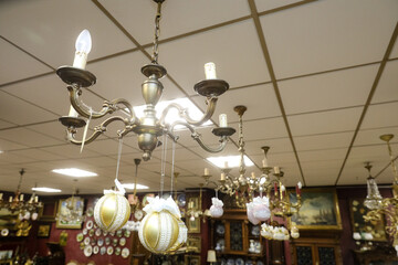 MINSK, BELARUS - 9 SEPTEMBER, 2022: shop selling vintage tableware and furniture antiques