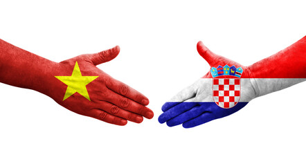 Handshake between Croatia and Vietnam flags painted on hands, isolated transparent image.