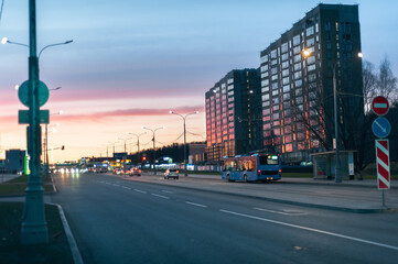 Fototapeta na wymiar City street at sunset