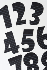 background with large black paper numbers
