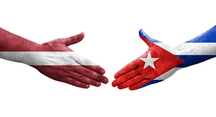 Handshake between Cuba and Latvia flags painted on hands, isolated transparent image.