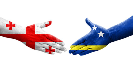 Handshake between Curacao and Georgia flags painted on hands, isolated transparent image.