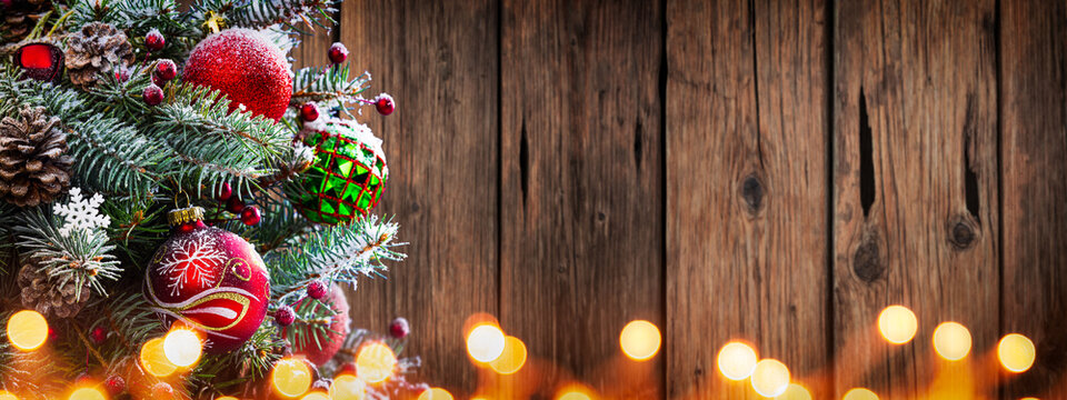  Decorated Christmas Tree With Rustic Wooden Background And Glowing Lights - Christmas