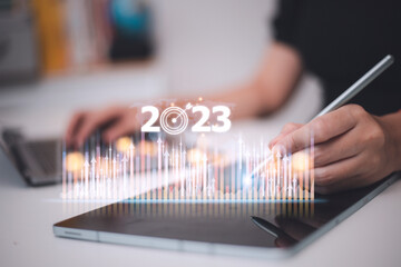 Business and Technology target set goals and achievement in 2023 new year resolution statistics graph rising revenue, planning to start up strategy, icon concept