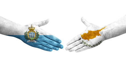 Handshake between Cyprus and San Marino flags painted on hands, isolated transparent image.