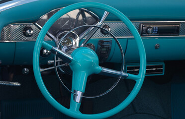 1950's automobile steering wheel and dashboard