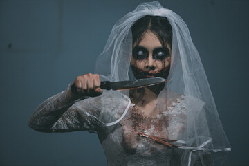 Portrait of asian woman make up ghost bride death and blood the horror is darkness scary horror...
